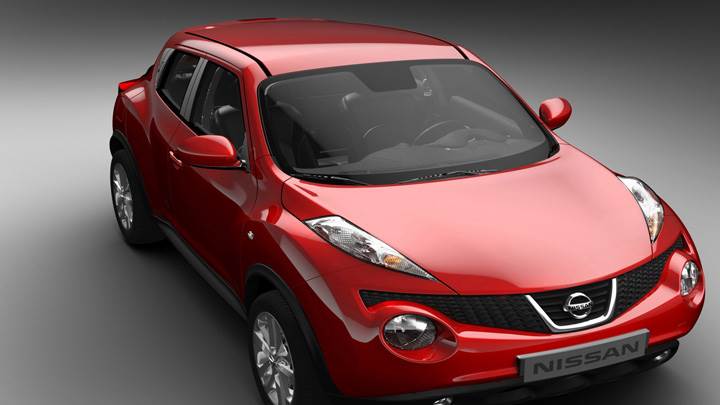 Side Front Pose Of 2011 Nissan Juke In Red